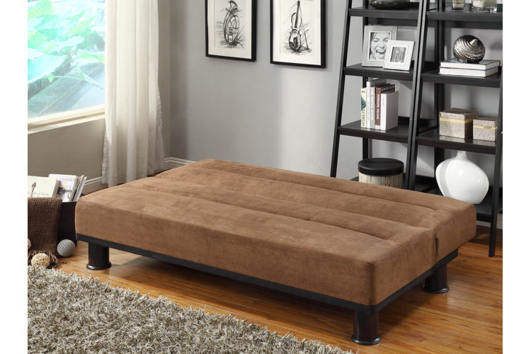 brown microsuede sofa bed reclined in a sleeping position