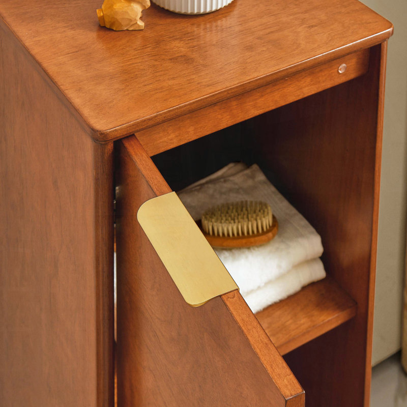 Armoire de rangement moderne moderne avec poignées en métal et pieds surélevés