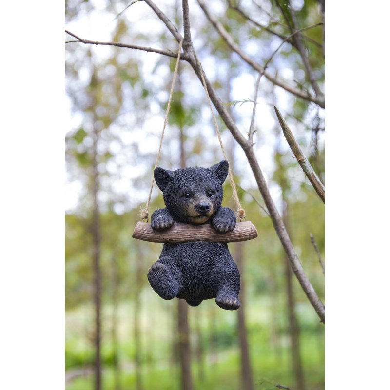 Ours noir suspendu