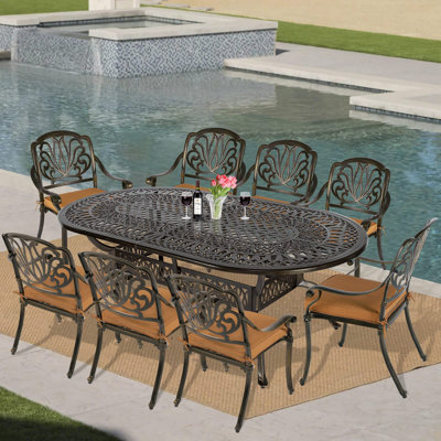 L'ensemble de salle à manger pour l'extérieur Vivijason 9 pièces, ensemble de conversation pour patio en aluminium coulé résistant aux intempéries, comprend 8 chaises rembourrées et une table ovale avec trou de parasol pour la cour du jardin