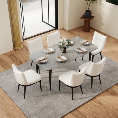 Ensemble table et chaises de salle à manger 6 personnes avec plateau en pierre frittée et revêtement en cuir PU.