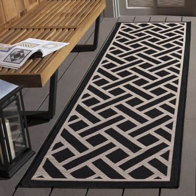 Tapis brun et brun clair pour l'intérieur et l'extérieur à motif floral Arneshia