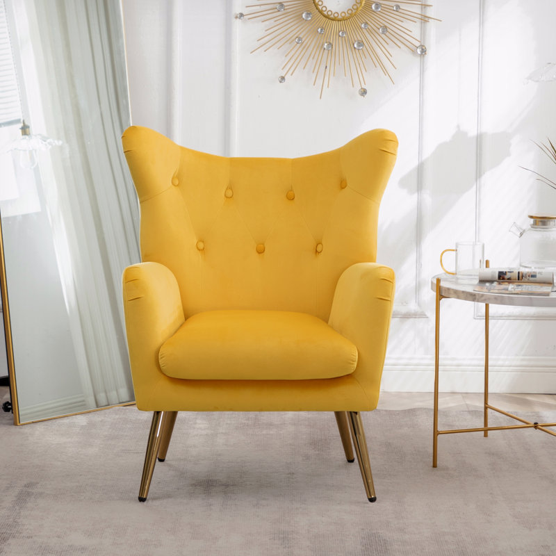 Fauteuil d'appoint en velours capitonné