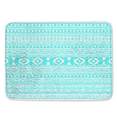 Tapis de bain turquoise à motifs géométriques