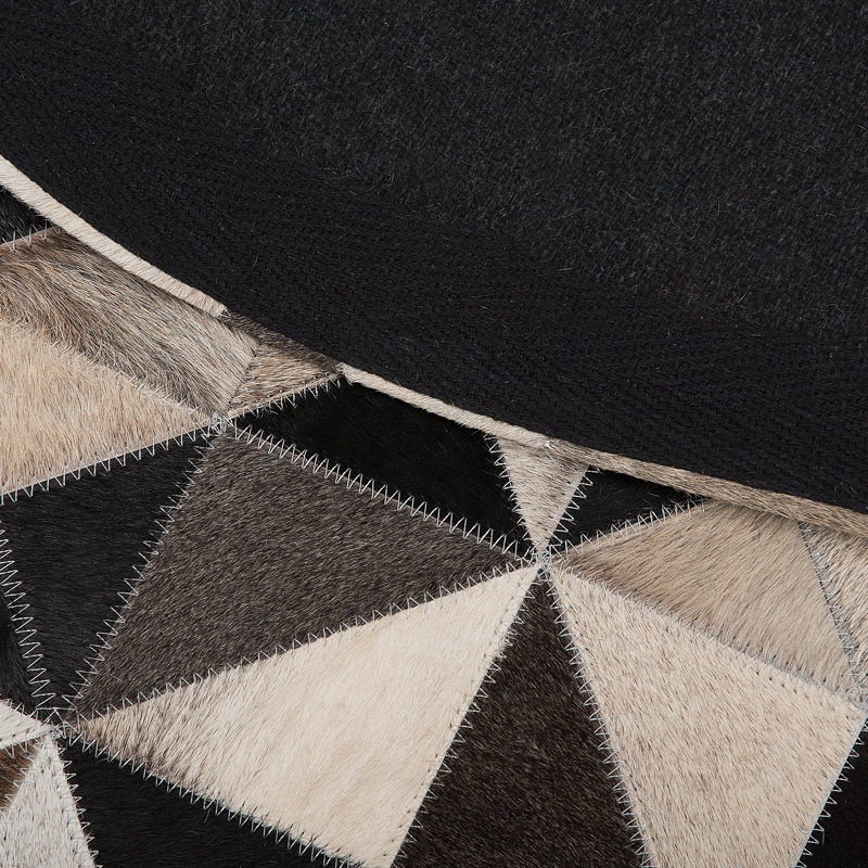 Gianna Round 140 cm x 140 cm Patchwork Cowhide Hand Woven Area Rug