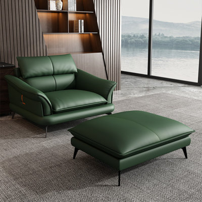 Fauteuil vert avec coussin en cuir véritable