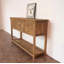 Console rustique en bois massif avec 4 tiroirs et tablette ouverte
