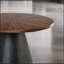 Table basse ronde de style contemporain avec plateau biseauté et base cylindrique, parfaite pour les espaces de vie modernes