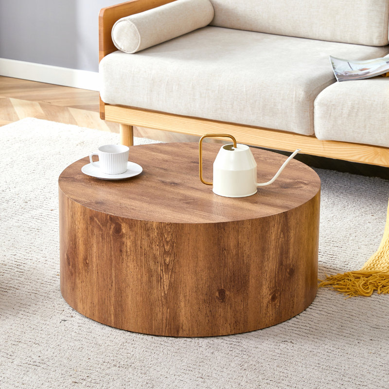 Table cylindrique polyvalente avec motif à motifs pour des utilisations multiples pour le café, la salle à manger et les espaces de travail.