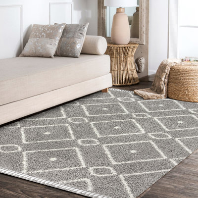 Tapis à losanges gris / crème à poils longs Howardville