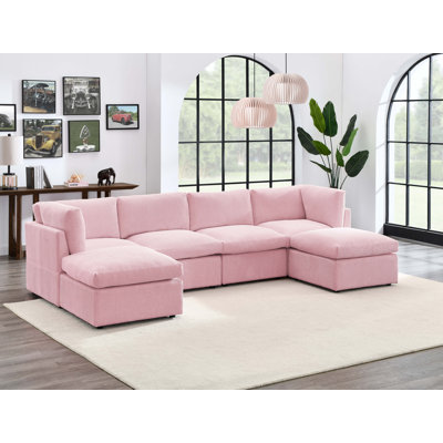 Annai 129" Wide Reversible Modular Corner Sectional with Ottoman
