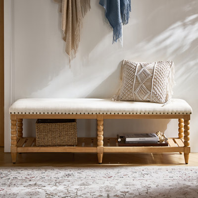 Banc de rangement en bois massif avec garniture cloutée Delfina