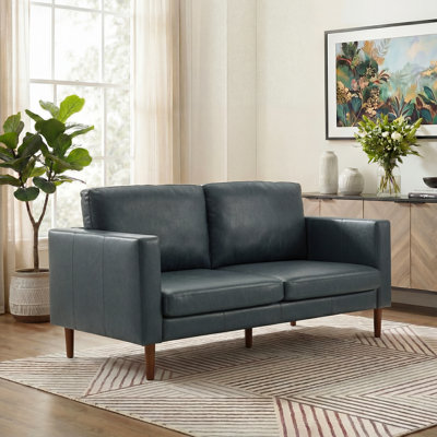 Ashvini 65" Faux leather Square Arm Loveseat with Reversible Cushions