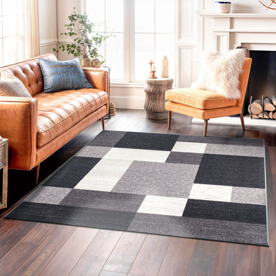 Tapis gris, noir et blanc touffeté à motif géométrique Akieba