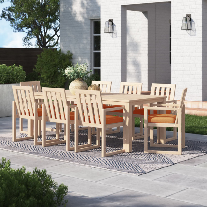 Sehrish Rectangular 8 - Person 87" Long Dining Set With Sunbrella Cushion Covers, Spectrum Cayenne Sunbrella® Plainweave