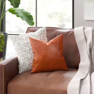 https://assets.wfcdn.com/im/95867280/resize-h310-w310%5Ecompr-r85/2270/227052063/faux-leather-pillow-cover.jpg