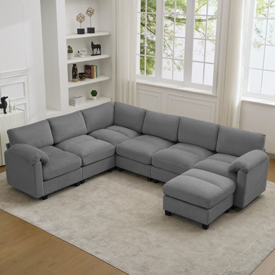 Canapé modulaire 7 places avec accoudoirs coussinés 7 places