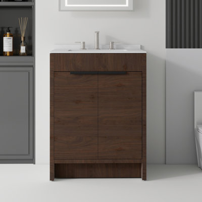 Meuble-lavabo autoportant de 61 cm (24 po) avec lavabo en céramique, armoire en contreplaqué, portes à fermeture amortie, comptoir et dosseret en marbre reconstitué blanc de Carrare de 1,5 cm (0,6 po), brun