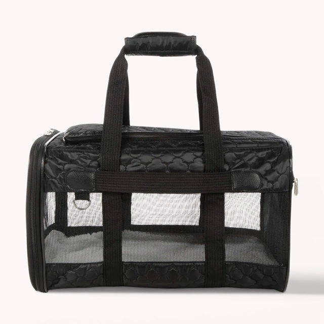 Black quilted Sherpa pet carrier with mesh windows.