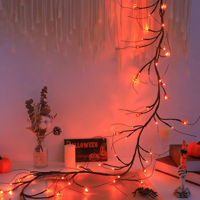 Guirlande lumineuse flexible de 180 cm (70,86 pouces) en branches de saule, avec lumières DEL orange et baies, idéale pour décorer un mur, un foyer, une fenêtre ou toute autre pièce.