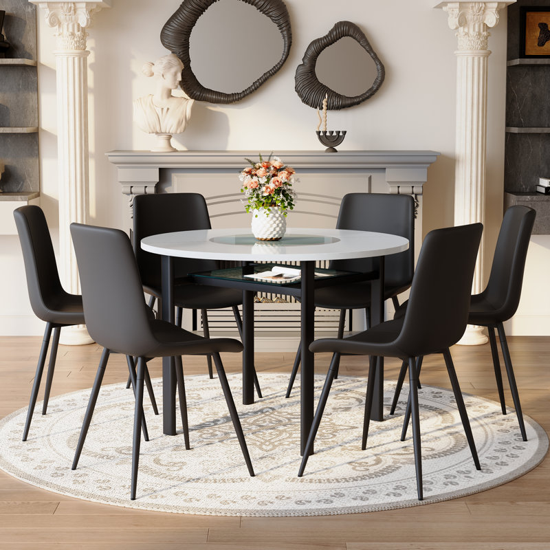 Ensemble table et chaises Ensemble de table de salle à manger moderne et minimaliste blanc de 42 pouces assorti de 6 chaises en polyuréthane artificiel noir avec coussins arrondis. Convient aux salles à manger, aux bureaux, etc.