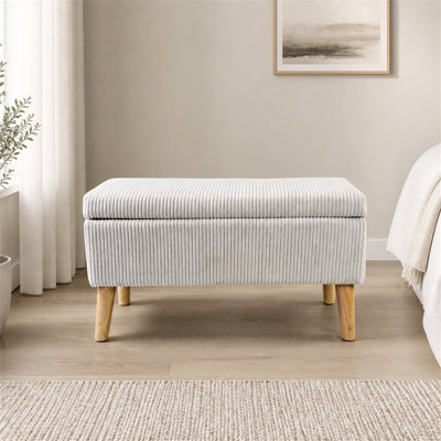 31.9-inch olive beige corduroy storage ottoman with wooden legs, flip-top storage, and cushioned bed end stool. Suitable as a ottoman/shoe bench in the living room, entryway, or bedroom.