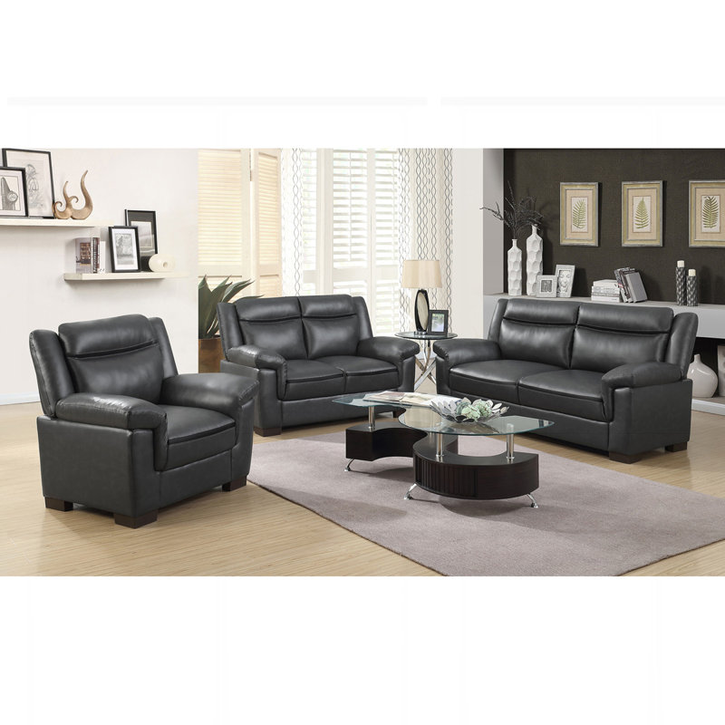 Causeuse contemporaine en similicuir avec accoudoirs coussinés