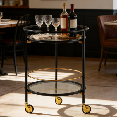 Chariot-bar rond moderne avec tablettes en verre trempé et accents dorés