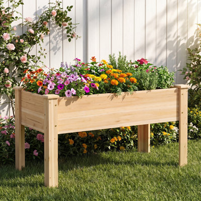 Pot à fleurs surélevé en bois