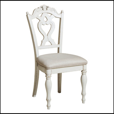 Élégante chaise d'appoint rembourrée avec coussin moelleux, parfaite pour les expériences culinaires confortables et élégantes.
