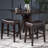 Contemporary Upholstered Saddle Counter Stool With Nailhead Trim And Elegant Design, Ideal For Kitchen And Bar Areas.