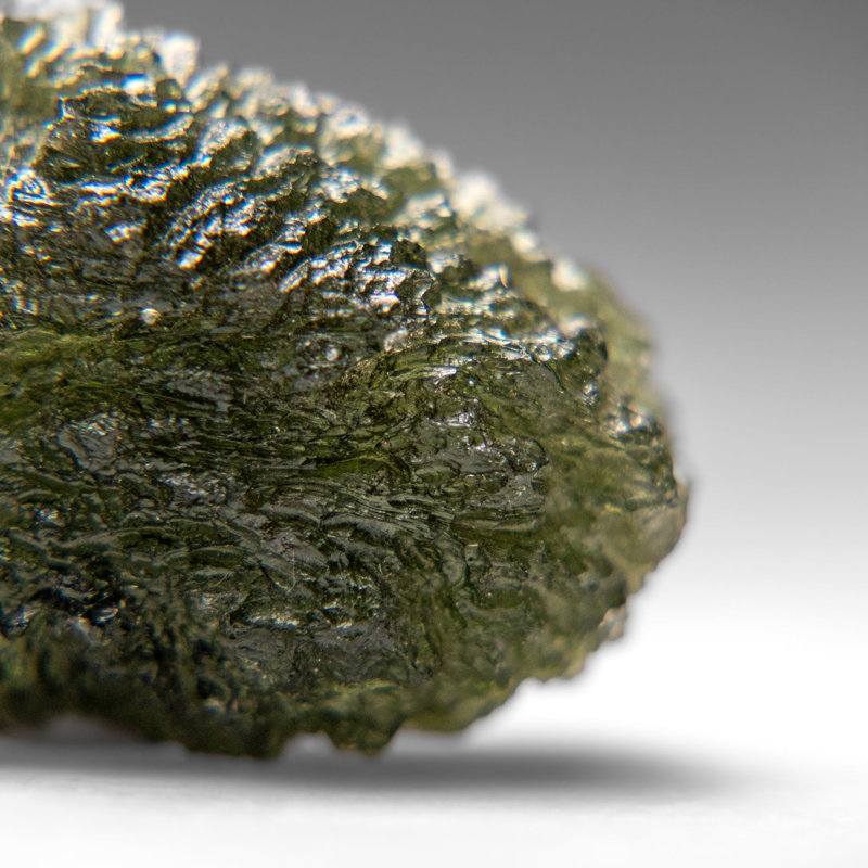 Genuine Moldavite Tektite (18.8 grams), 0.5" H x 1" W x 1.75" D