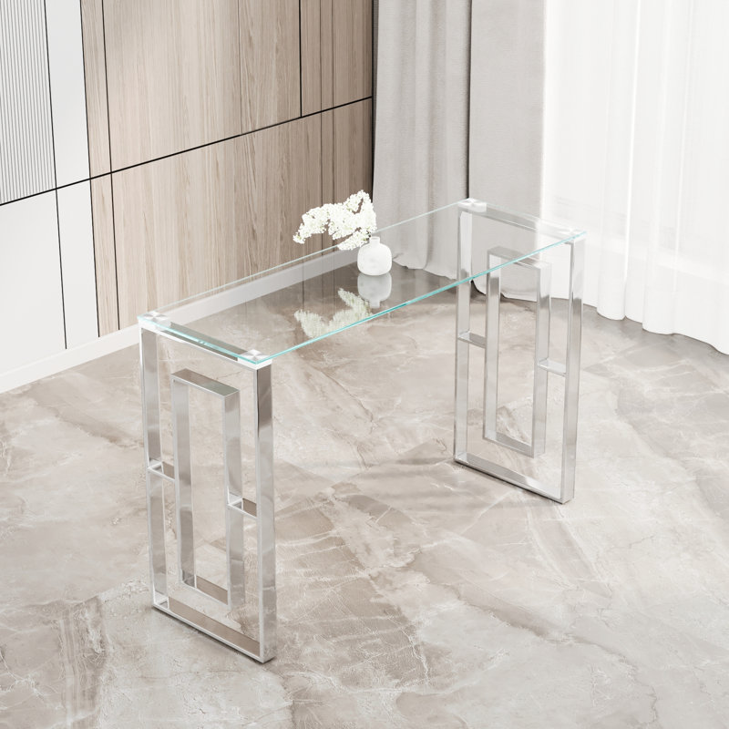 Console en acier inoxydable avec pieds en verre transparent