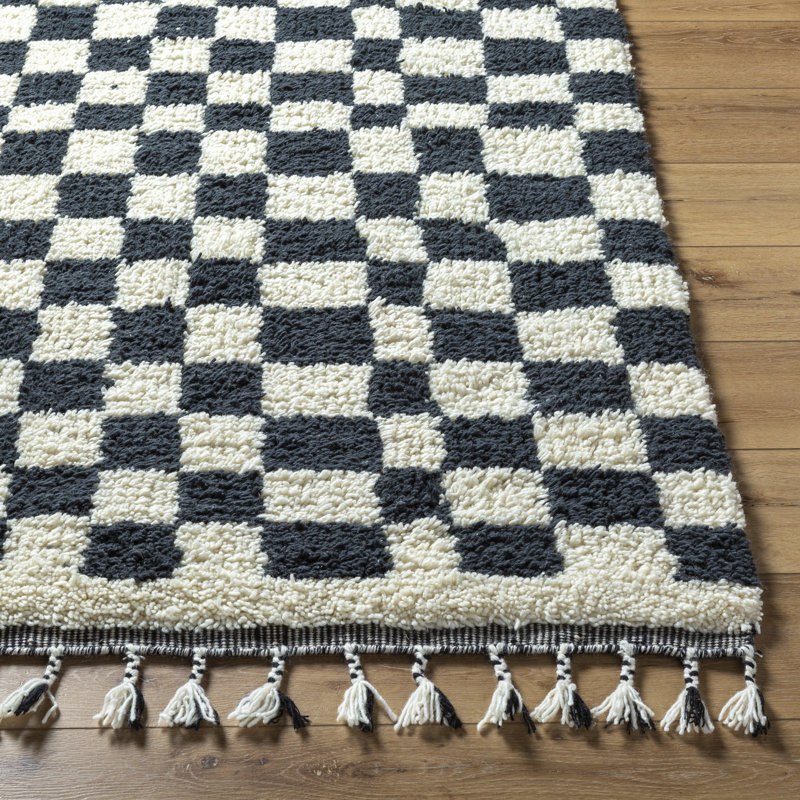 Black and Ivory Geometric Wool Rug with Tassels