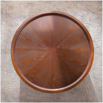 Table basse ronde avec rangement caché, design Mid-Century moderne, finition en bois foncé et pieds noirs pour le salon