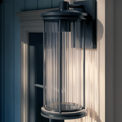 Barras 20.25" 1-Light Outdoor DarkSky Approved Wall Sconce with Clear Ribbed Glass in Black