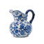 Vase en forme de pot à lait en céramique bleu et blanc avec motif floral et poignée