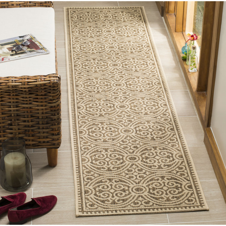 Burnell Ikat Cream/Beige Area Rug