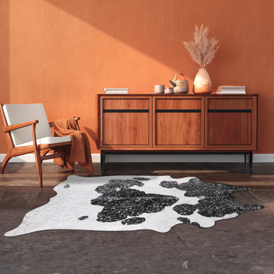 Custom Silver Metallic on Black and White Cowhide Rug