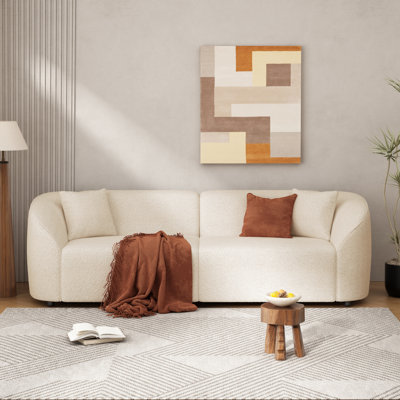  87" Curved Contemporary Sofa in Beige, Luxury Sculptural Bouclé Couch, Modern Textured Seating for Living Room or Lounge