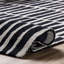 Tapis noir / ivoire / crème en laine fabriqué à la main à motif géométrique Odalis-397670958