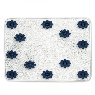 Tapis de bain bleu à motif floral