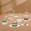 Ensemble de 12 présentoirs à desserts ronds-101986864