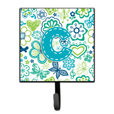 Crochet mural fleurs et papillons