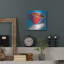 Art mural en métal luxueux «Red Coffee Cup On Blue» par Ron Magnes, 24 po x 24 po-101657888