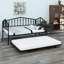 Le lit de jour avec lit gigogne présente des lignes fluides et élégantes ainsi qu'un espace de couchage escamotable polyvalent.-1130358387