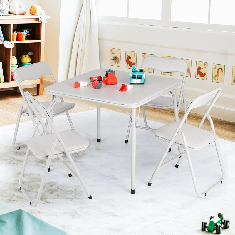 Table pliante en acier avec chaises rembourrées en cuir, coussins confortables, structure robuste, compact pour manger, étudier, jeux