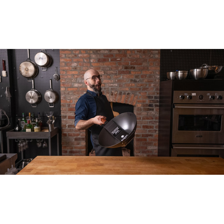 https://assets.wfcdn.com/im/95964708/resize-h755-w755%5Ecompr-r85/2567/256707020/Babish+14%27%27+Non-Stick+Carbon+Steel+Wok.jpg