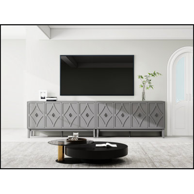 Vintage 4-Door Storage Cabinet With Hand-Carved Geometric Doors, Adjustable Shelves, And Raised Legs For Easy Cleaning, Perfect For Living And Dining Rooms