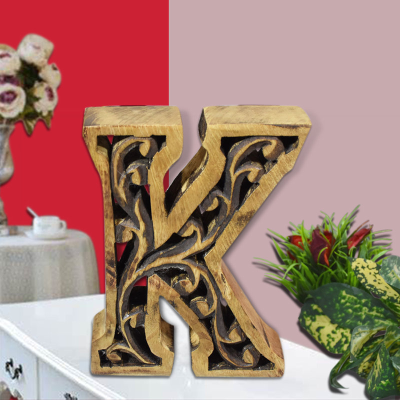 Alphabet écologique, K, Brun héritage sculpté
